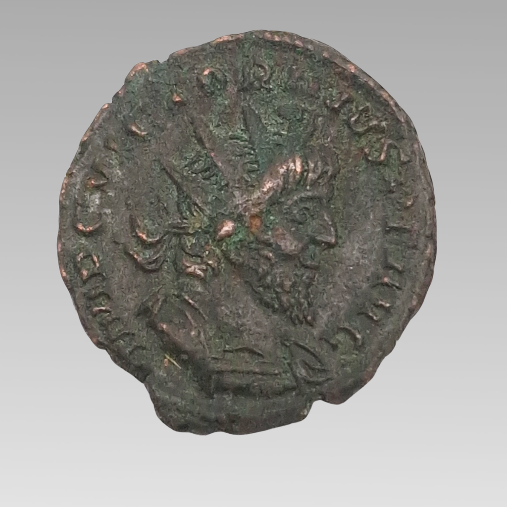 Ancient Roman 3rd century antoninianus radiate coin showing emperor portrait, approximately 19mm.
