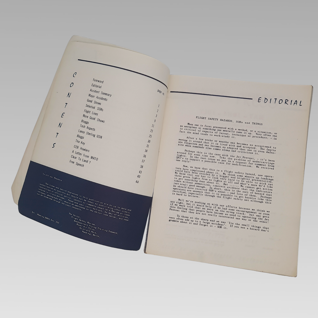 Open pages showing the contents and editorial sections.
