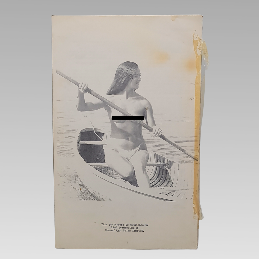 Rear cover with promotional photograph and publication credit.