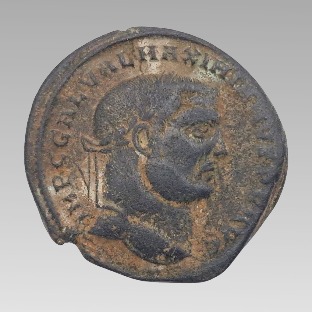 Ancient Roman Galerius bronze follis circa AD 307-309 showing laureate imperial portrait, 24mm