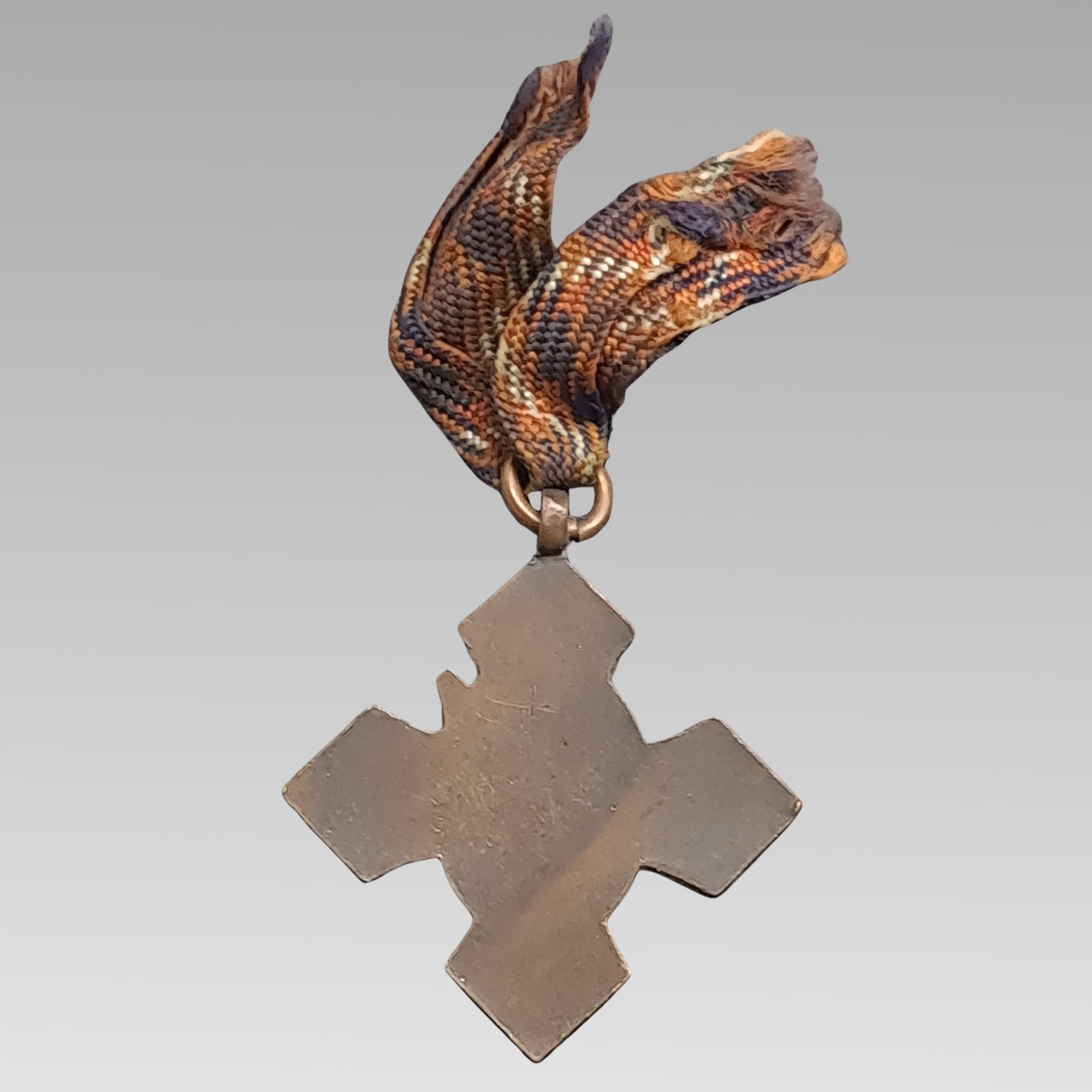 Reverse of antique Army Temperance Association medal showing plain back