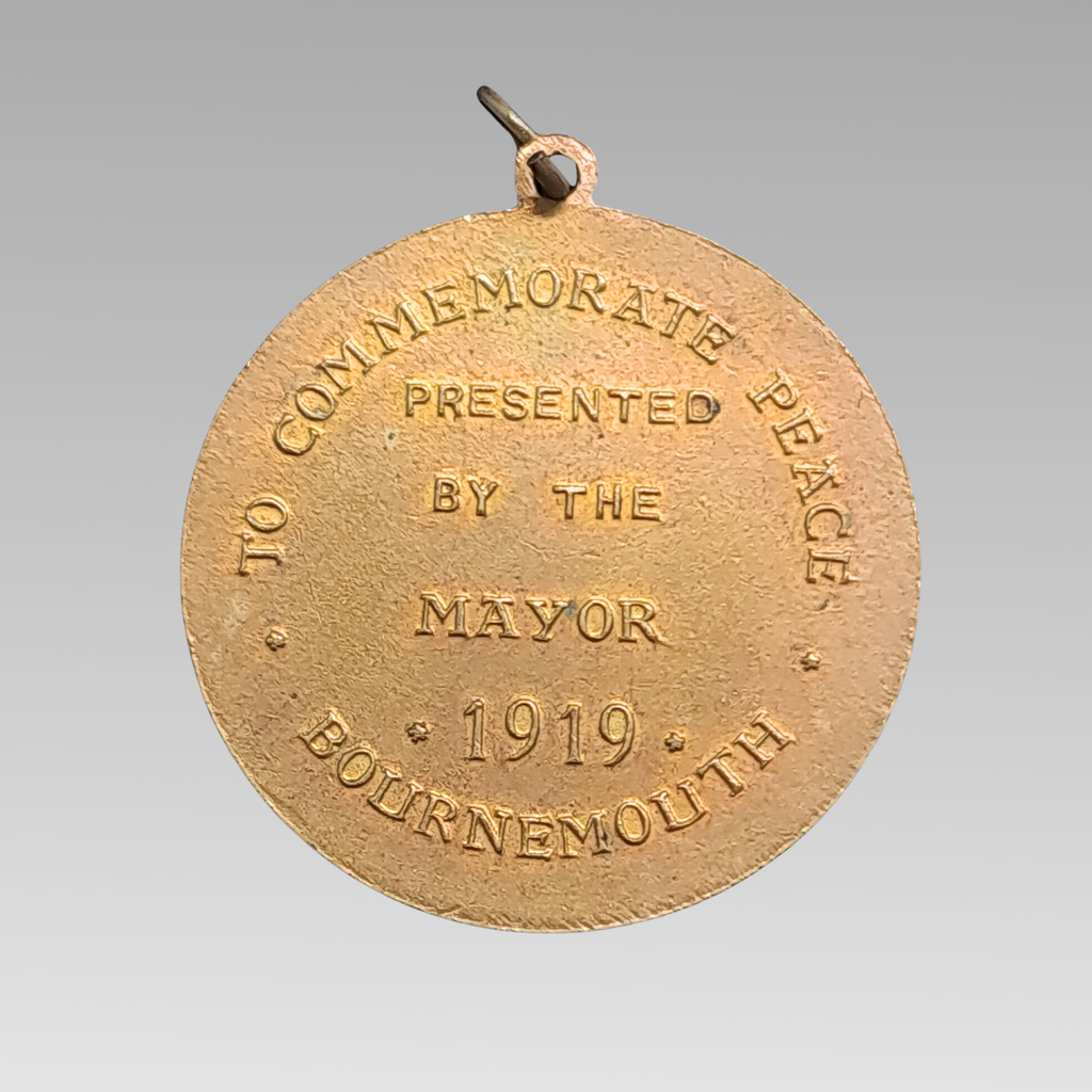 Reverse of WW1 peace medal mayor Bournemouth 1919 inscription