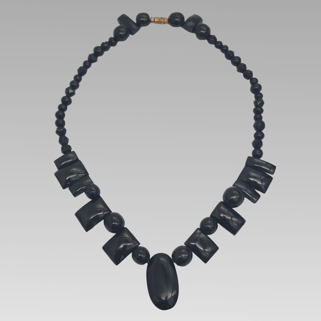 Antique Whitby jet necklace showing complete graduated Victorian design