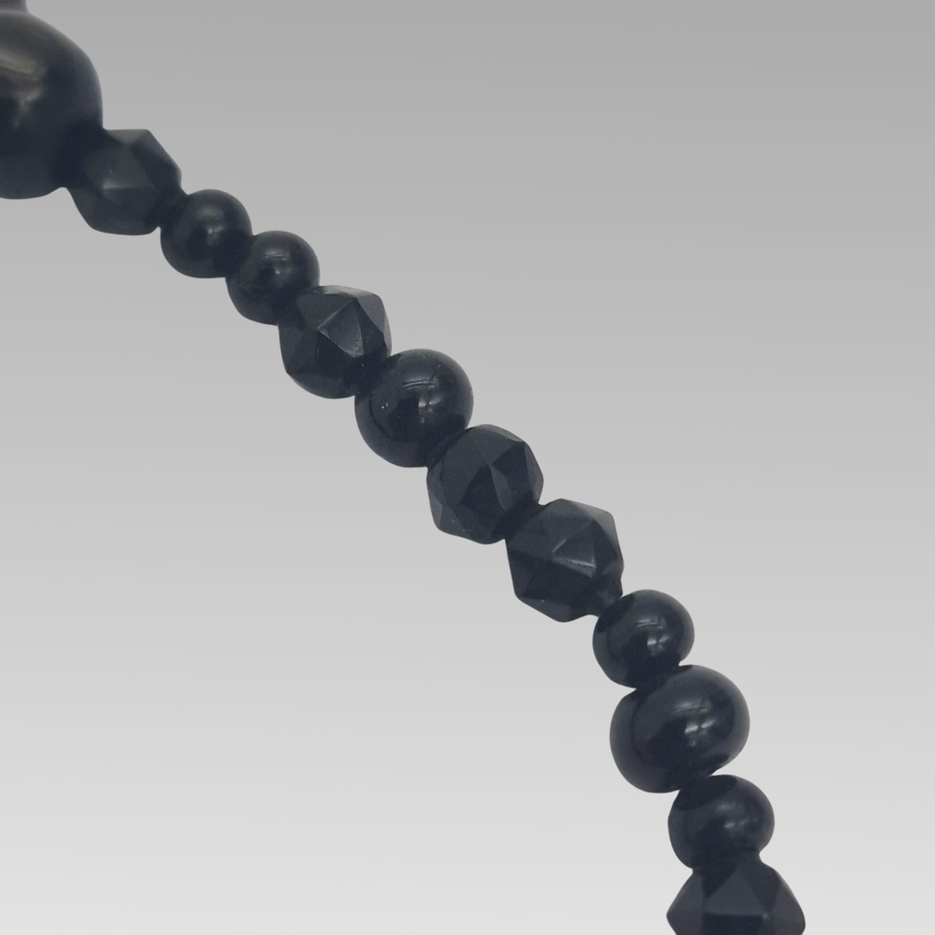 Detail of polished beads on antique Whitby jet mourning necklace