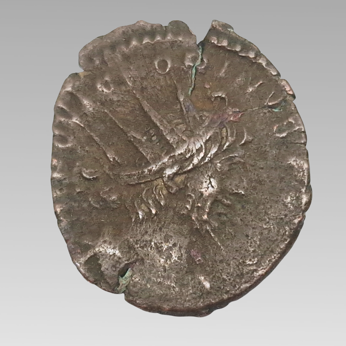 Ancient Roman Victorinus antoninianus coin AD 269-271 showing heavily worn surviving design and ancient patina